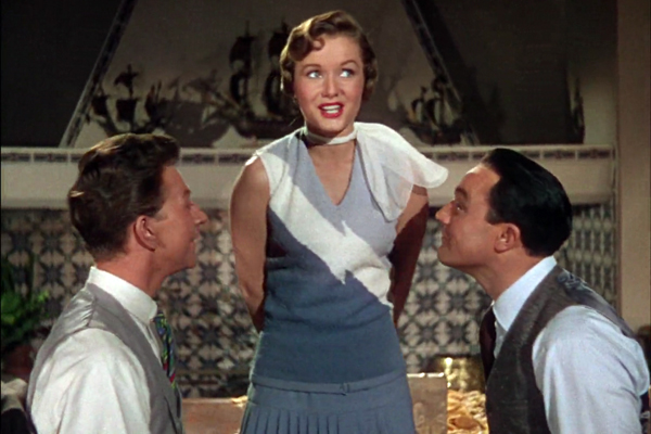 Debbie Reynolds com Donald O’Connor e Gene Kelly em “Cantando na Chuva”, de 1952 (Foto/Frame)