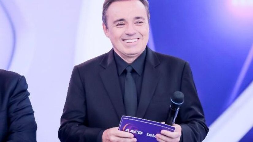 O apresentador ficou marcado pelo programa 'Domingo Legal', no qual comandou por 16 anos/Divulgação/SBT