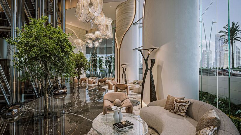 O lobby do hotel combina arte, vegetação interna e pé-direito monumental para receber hóspedes com um visual digno de galeria futurista/ Reprodução Ciel Dubai Marina