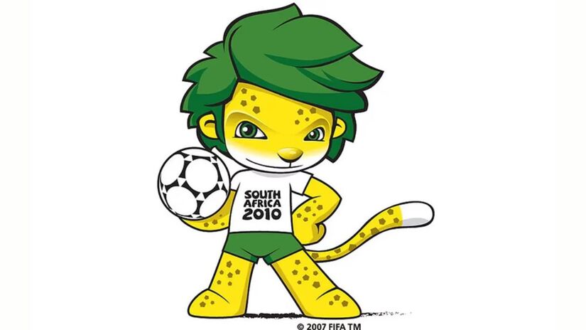 A África do Sul apresentou ao mundo, em 2010, Zakumi, um simpático leopardo cujo nome combina'ZA', sigla do país, com 'kumi', que significa '10' em diversas línguas africanas, em referência ao ano do torneio. Com os cabelos tingidos de verde para se camuflar no gramado, Zakumi chamou atenção pelo visual marcante e se tornou um dos símbolos mais lembrados do primeiro Mundial realizado em solo africano/ Reprodução Olympics.com