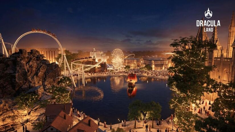 Área central do parque temático, com lago cenográfico, montanha-russa de última geração e cenários inspirados na Transilvânia, iluminados para experiências noturnas imersivas/ Divulgação Dracula Land