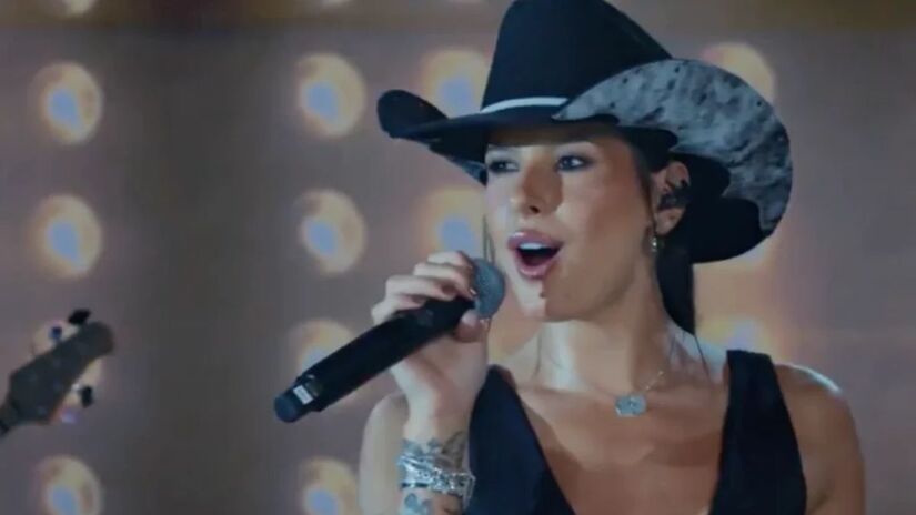 Cantora movimenta a trama ao revelar romance antigo com João Raul /Reprodução