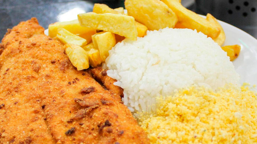 O PF varia por região e pode incluir peixe, carne seca ou até baião de dois Divulgação
