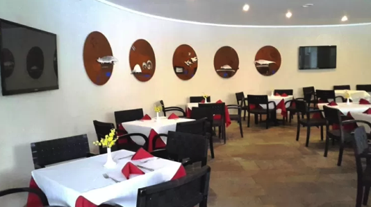 Salão interno do Restaurante Cocar
