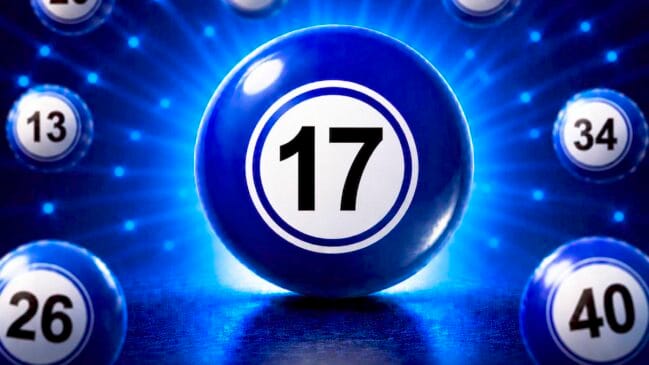 Bola de loteria azul brilhante em destaque com o número 17 centralizado em um círculo branco