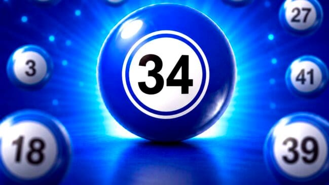 Bola de sorteio azul brilhante em destaque com o número 34 em preto no centro de um círculo branco