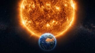 Representação da Terra em primeiro plano com o Sol gigante e flamejante ao fundo no espaço sideral.