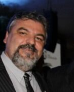 Ricardo Augusto Joaguim, ex-secretário de Governo de Guarujá, assassinado em evento político (2012)