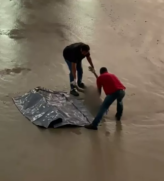 Corpo na praia da Enseada
