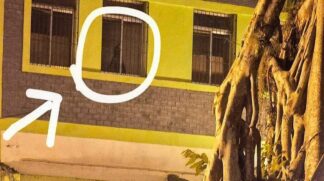 Vulto é visto em janela de prédio em Santos, no litoral de SP