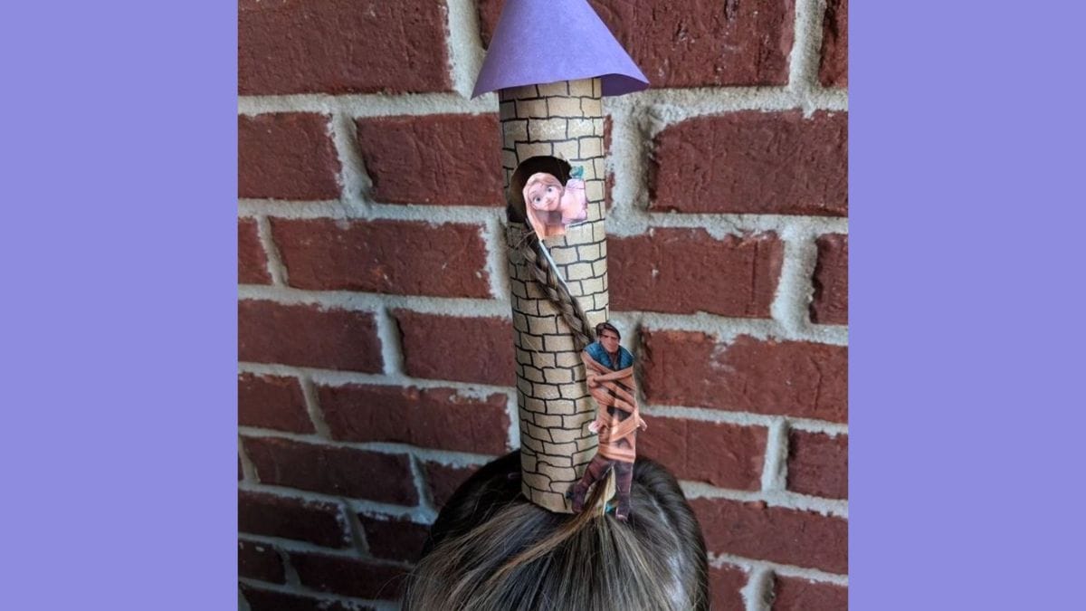 Um rolo de papel vira uma torre e o cabelo trançado se transforma nas longas madeixas de Rapunzel, um penteado digno de conto de fadas/ Reprodução Pinterest/Myfestidea