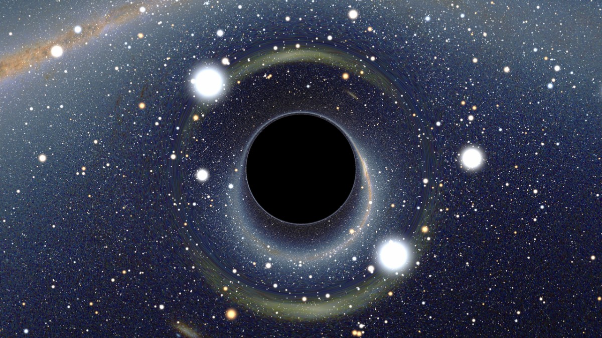 Simulação mostra um buraco negro diante da Grande Nuvem de Magalhães, revelando o efeito de lente gravitacional e distorções visuais / Alain r/Wikimedia Commons