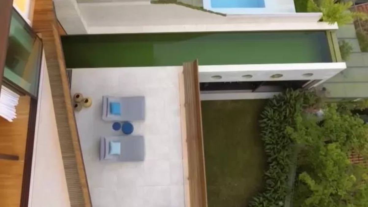Grandes aberturas garantem iluminação natural constante e mantêm o contato com o verde ao longo do dia/Reprodução/Youtube